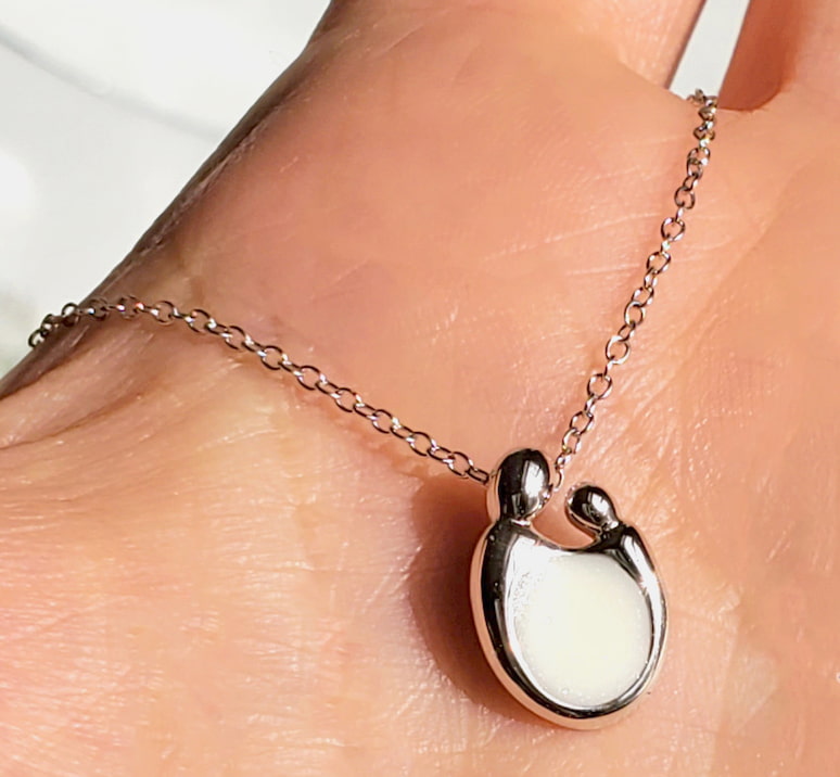 Collier en lait maternel