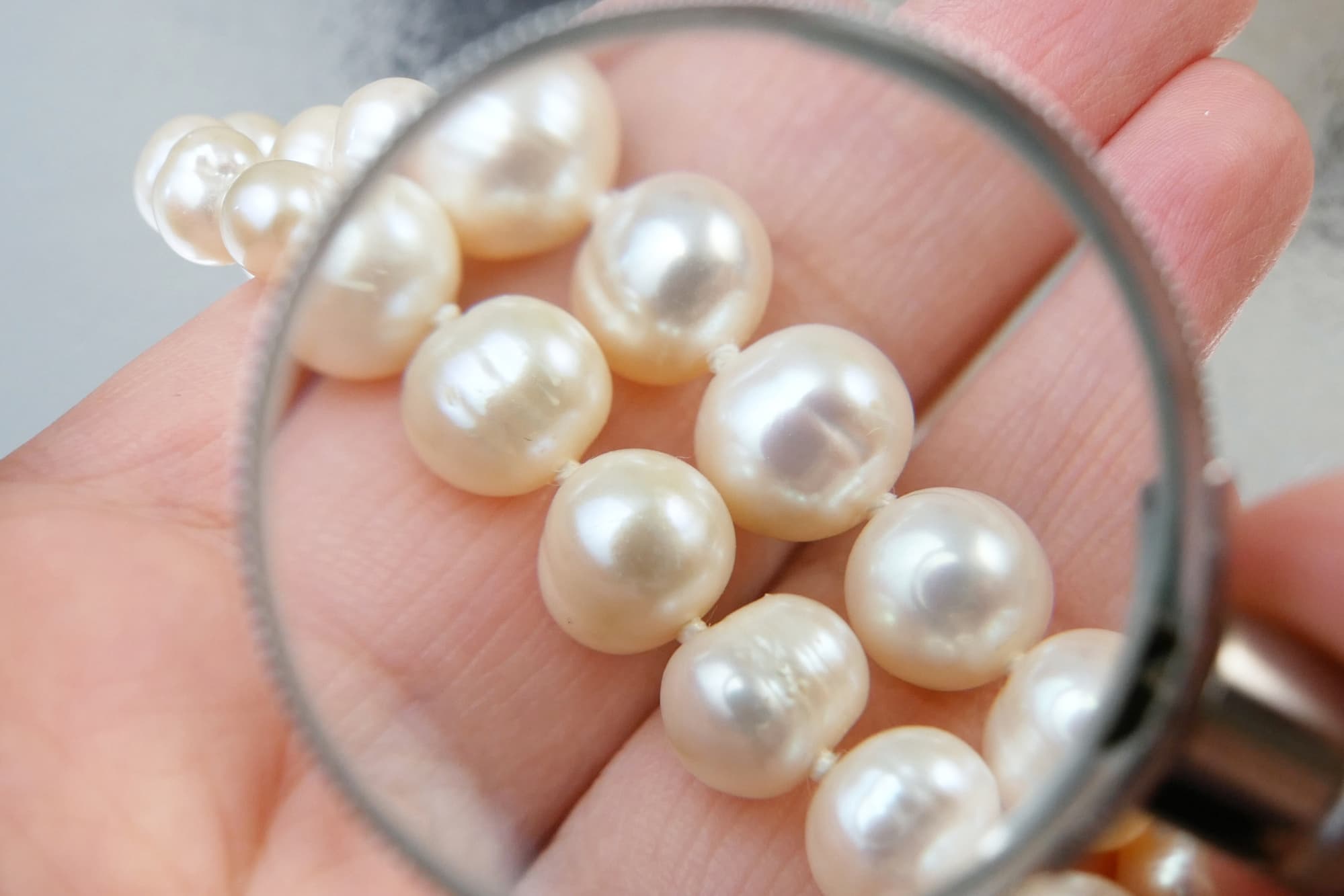 how to tell if a pearl necklace is real